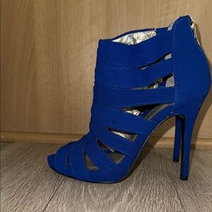 BCBG Blue Caged Heels with Peep-Toe Design